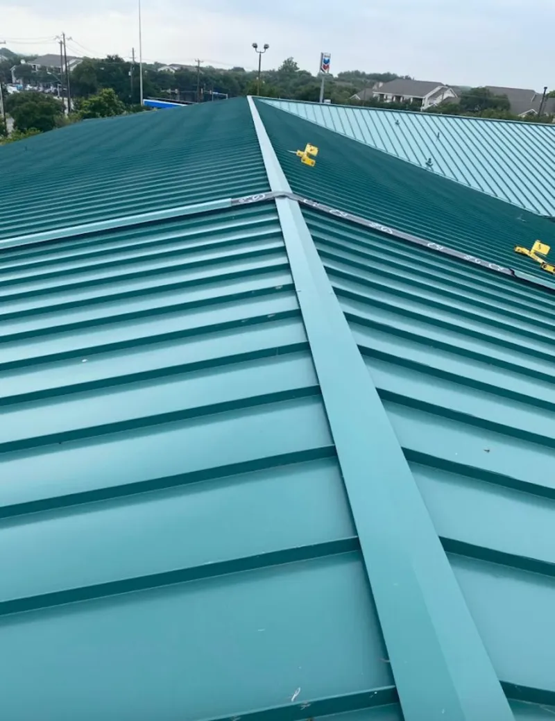 Green commercial metal roof ridge and valley for Metal Roof Repair in La Grande